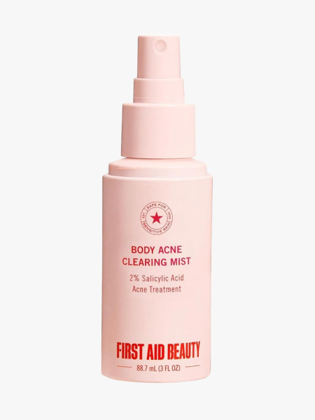 First Aid Beauty Body Acne Clearing Mist in branded component on a light gray background