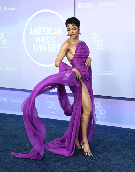 Teyana Taylor wearing a purple strapless gown